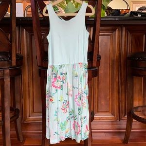 Turquoise flowy summer dress with floral skirt.